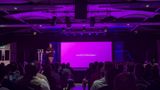Brecht presenting at Middlesbrough Front End with a purple slide behind him that has the text: the basics of creating a good UI